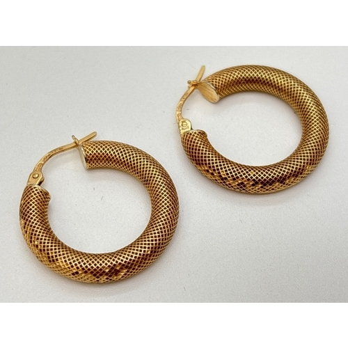 72 - A pair 0f 9ct gold honeycomb design huggie style hoop earrings. Approx. 2.25cm diameter. Hallmarked ... 