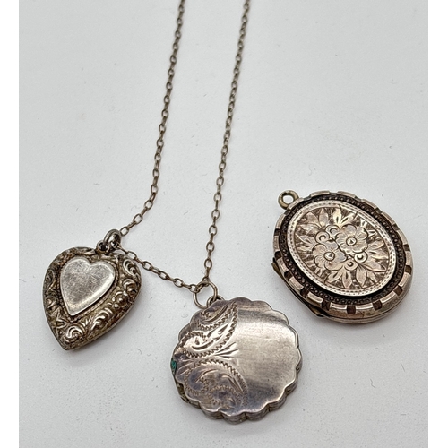 1033 - 3 vintage silver lockets and a 16