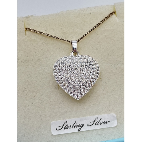 1038 - A boxed 'Ice Glitz' diamante heart shaped domed pendant on a 24