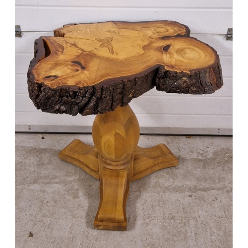 1381 - A rustic wooden occasional table made from a large slice of tree trunk. Approx. 74cm tall x 75cm wid... 