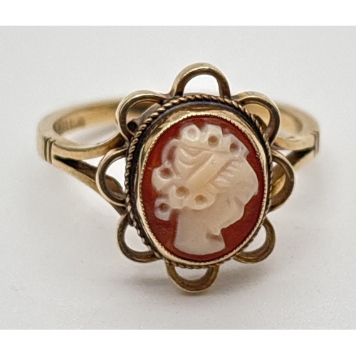 1096 - A 9ct gold cameo set ring with scallop edged mount. Fully hallmarked inside band. Total weight appro... 