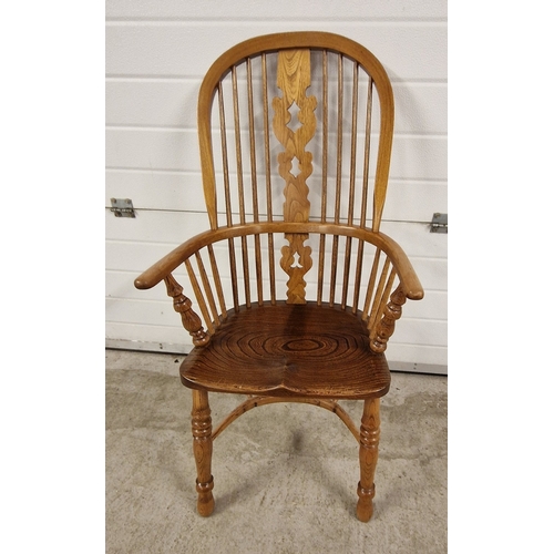 1402 - A vintage ash & elm windsor armchair with spindle back, shaped backsplat and crinoline stretcher. Ap... 