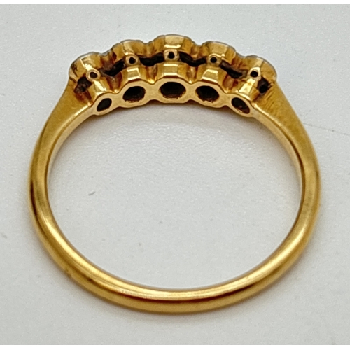 38 - A vintage 18ct gold and diamond 5 stone eternity ring. Graduating sized diamonds in an illusion sett... 