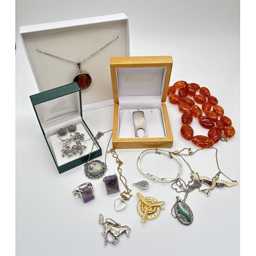 1085 - A collection of vintage and modern costume jewellery, some boxed. To include marcasite set floral ne... 