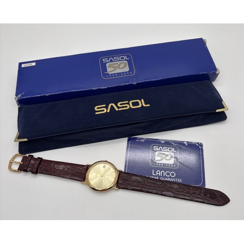 1153 - A boxed Mens Ltd Edition SASOL Commemorative Lanco quartz watch with brown leather strap - as new. B... 