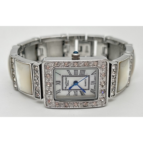 1155 - A boxed mother of pearl and crystal ladies quartz wristwatch from the Marcel Drucker collection. Squ... 