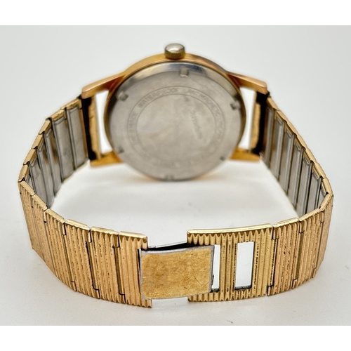 1160 - A vintage Allaine men's automatic wristwatch with gold plated case and strap. Pale gold face with go... 