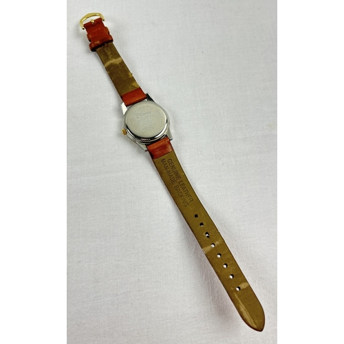 1163 - A Disney licensed Winnie The Pooh wristwatch by Seiko Sll MU0696, with moving bumble bee seconds han... 