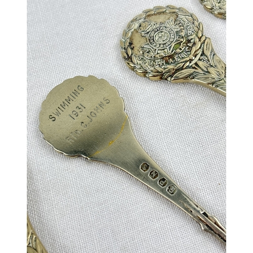 1171 - 12 assorted collectors spoons to include 7 x 1st Kings Royal Rifles South Africa 1900-2 spoons with ... 