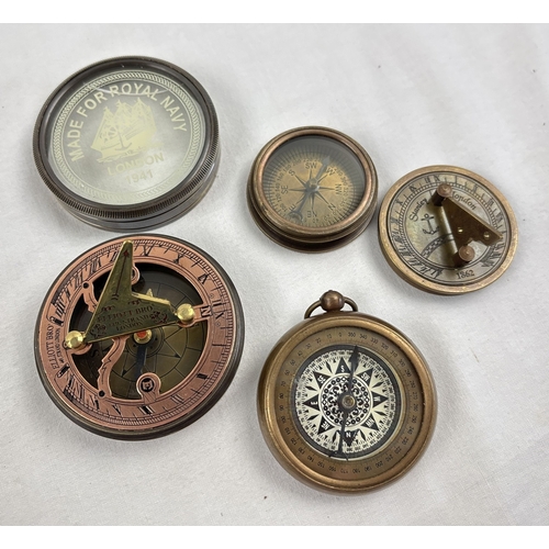 1197 - 3 metal cased naval compasses. A small brass cased pocket watch compass (approx. 5.5cm diameter); a ... 