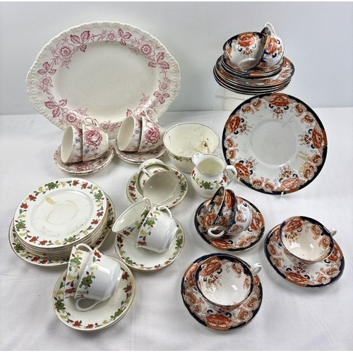 1234 - A box of assorted antique and vintage teaware. An Aynsley tea set with green & red floral design bor... 