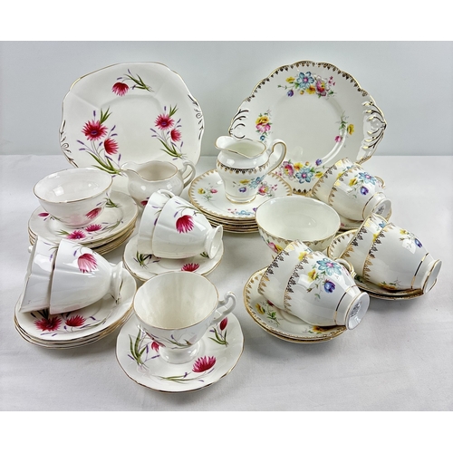 1244 - 2 vintage bone china tea sets with floral design pattern.  A 6 setting Salisbury China set with gilt... 