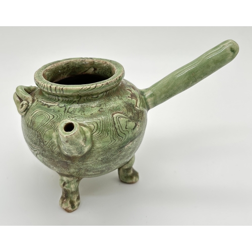 1267 - A Chinese pottery water pourer with marbled effect green glaze, raised on tripod feet. Approx. 8.5cm... 