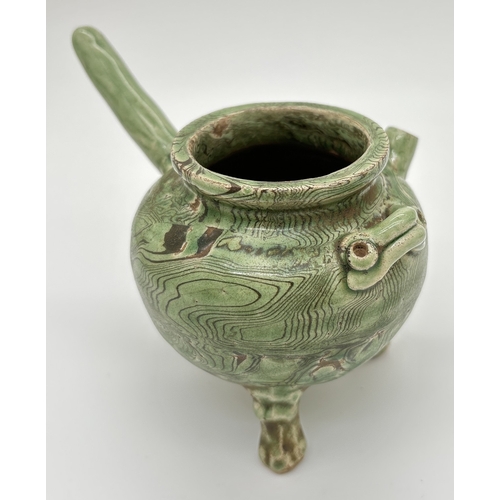 1267 - A Chinese pottery water pourer with marbled effect green glaze, raised on tripod feet. Approx. 8.5cm... 