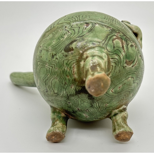 1267 - A Chinese pottery water pourer with marbled effect green glaze, raised on tripod feet. Approx. 8.5cm... 