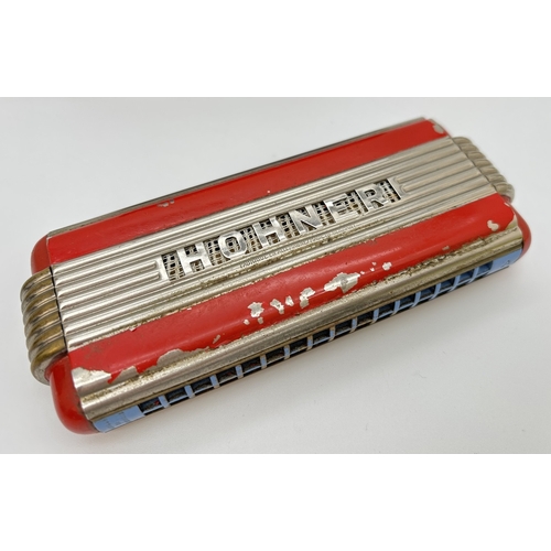 1269 - A vintage Echo Elite Harmonica by Hohner in A and D key. With original box. Some flaking to red pain... 