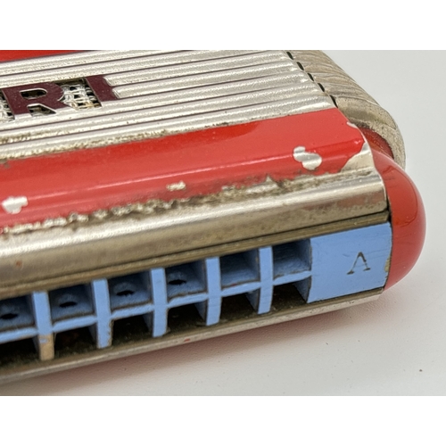 1269 - A vintage Echo Elite Harmonica by Hohner in A and D key. With original box. Some flaking to red pain... 