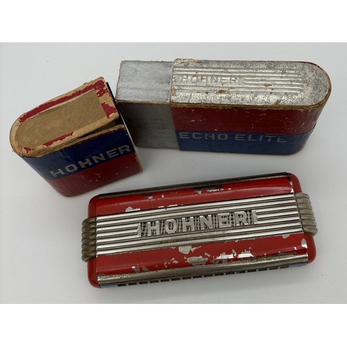 1269 - A vintage Echo Elite Harmonica by Hohner in A and D key. With original box. Some flaking to red pain... 