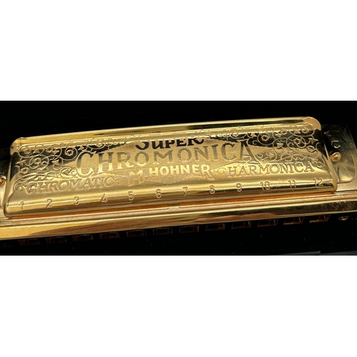 1270 - A cased Super 270 Chomonica Chromatic Harmonica by Hohner in a gold tone finish. In the key of C. En... 