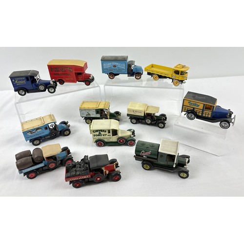 1296 - 24 assorted Matchbox Models of Yesteryear advertising vehicles to include vans, removals lorries, ta... 