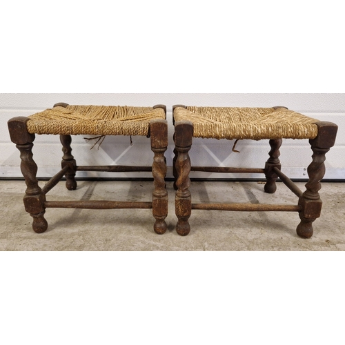 1308 - 2 dark oak stools with barely twist legs, one with string top seat, one with rush seat. Both approx.... 