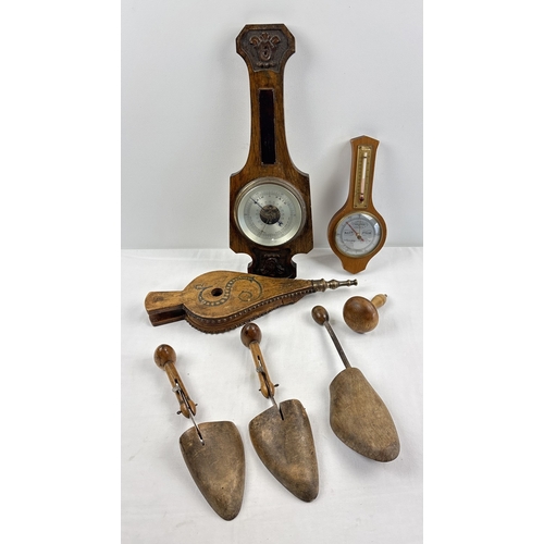 1318 - A box of assorted vintage wooden items to include Bellows, Barometers, darning mushroom and shoe las... 