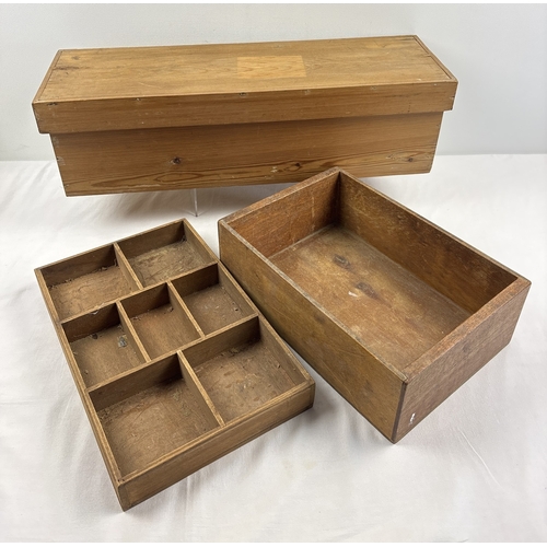 1322 - 3 vintage wooden items, long shaped pine box with modern brass handles together with 2 vintage stora... 