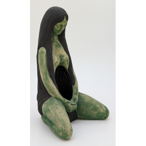 1349 - A green scource sculpture of a female kneeling with amethyst crystal to interior by Philipa Bowers. ... 