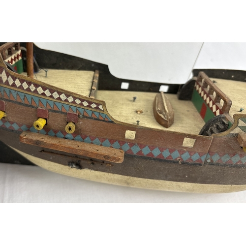 1356 - 2 vintage wooden model ships. Largest approx. 35cm tall x 40cm long.