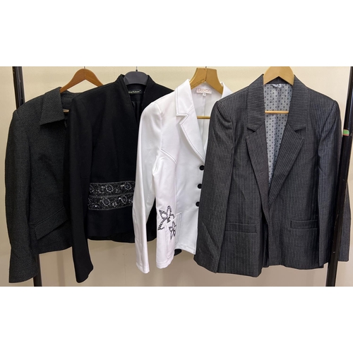 2014 - 4 modern design women's jackets in shades of white and black. To include a black wool jacket with be... 