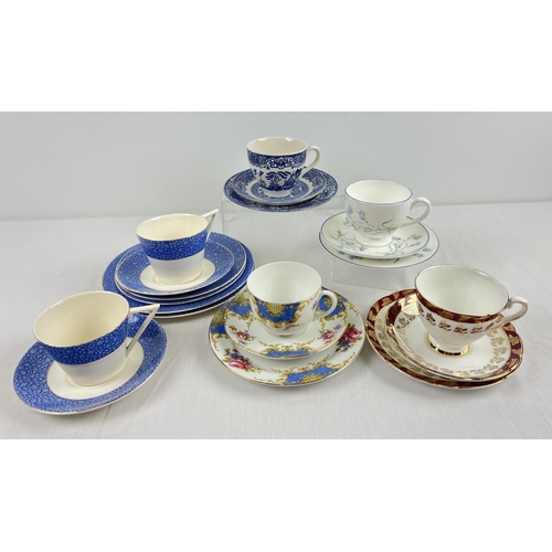 1230 - A collection of 6 assorted ceramic trios to include Wedgwood 'Florida' pattern, 'Morning Glory' from... 