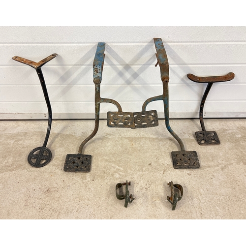 1191 - A collection of vintage cast metal carriage/buggy steps and reign guides. To include a matching pair... 