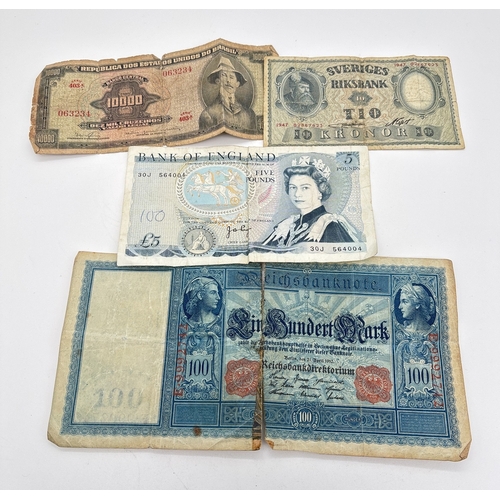 2 - 4 vintage British and foreign bank notes. A Duke Of Wellington £5 note (30J 564004), a 10 Kronor not... 