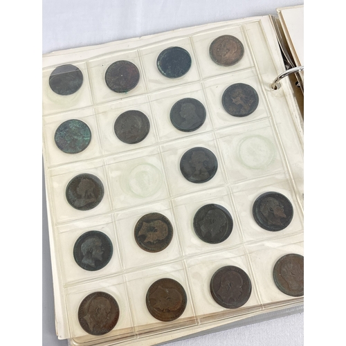 5 - A vintage coin collectors album containing assorted antique & vintage half pennies & farthings. To i... 