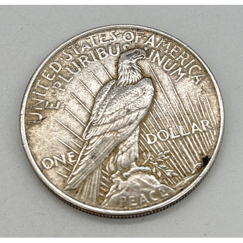 12 - A 1923 silver American Morgan 