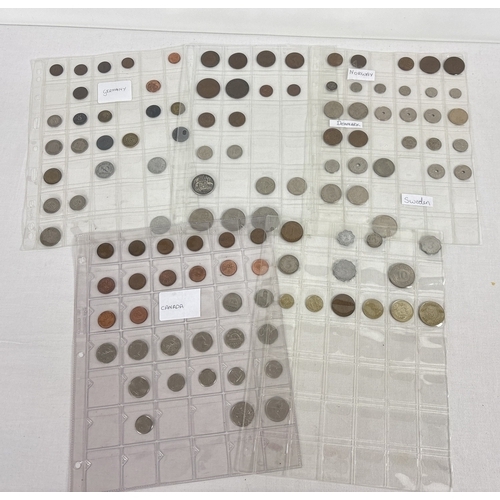 13 - A collection of assorted 20th century foreign coins in 5 clear plastic display sleeves. Contains coi... 