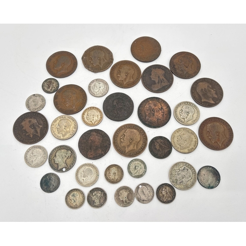 14 - A small collection of antique British coins to include Georgian pennies, Victorian 3 pence coins & i... 