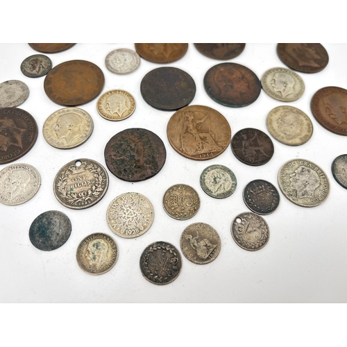 14 - A small collection of antique British coins to include Georgian pennies, Victorian 3 pence coins & i... 