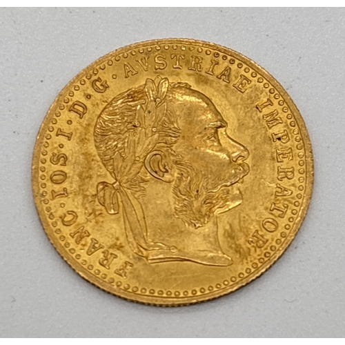 15 - A 1915 restrike 23ct gold Austrian 1 Dulcat coin featuring Emperor Franz Joseph I to obverse & Austr... 