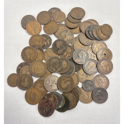 18 - A collection of 75 antique and vintage pennies and half pennies to include the sovereign heads of Ge... 