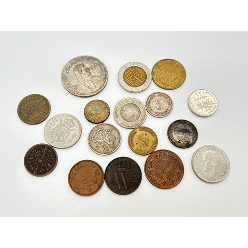 34 - A small collection of assorted antique & vintage foreign coins. To include 2 x 1874 German Pfennig c... 