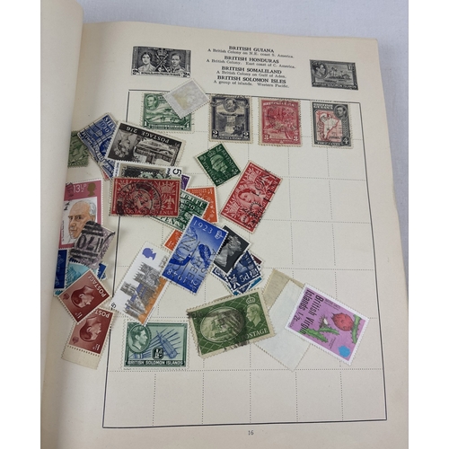 40 - A vintage 1930's Liberty postage stamp album & slip cover containing assorted world stamps.