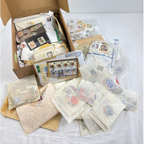 49 - 2 boxes of vintage and modern British and foreign used stamps in various conditions. To include exam... 