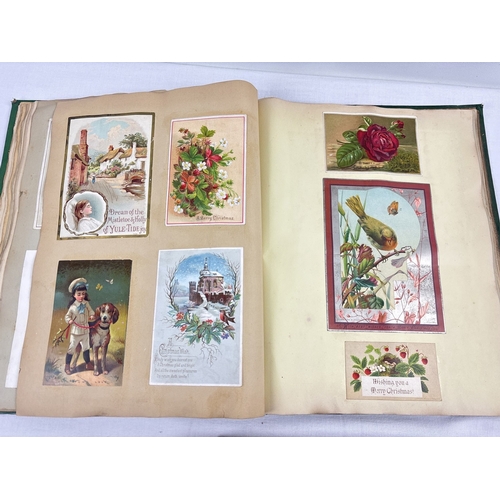 165 - 2 Victorian Scrap albums with gilt detail to covers containing assorted scraps and greetings cards. ... 