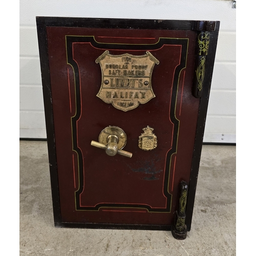 A Victorian safe by Lumby's of Halifax, with hand painted detail and brass plaque, handle and key escutcheon. Complete with keys. In very good original condition with paper label to inside still intact. Approx. 56cm tall x 39cm wide.