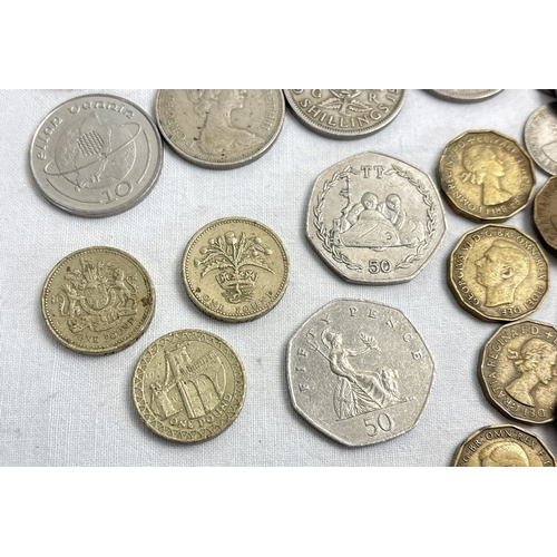 25 - A small collection of vintage George VI and Elizabeth II coins. To include Ise Of Man TT race 50p co... 