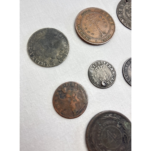 26 - 10 antique British and foreign coins. A Victoria 1870 Ceylon 5 cent coin, George I 1723 farthing, Ge... 