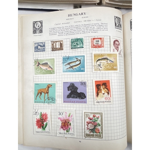 41 - A vintage Stanley Gibbons Fanfare stamp album together with a quantity of loose stamps & 100 Years o... 