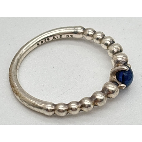 1100 - 2 Pandora birthstone silver bead stacking rings. Blue stone ring for September (size 52) together wi... 