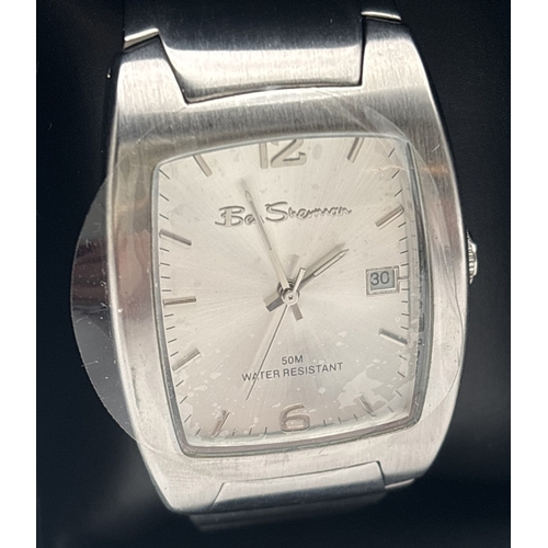 1210 - A boxed men's S683 wristwatch by Ben Sherman. Stainless steel case and strap with pale silver face. ... 